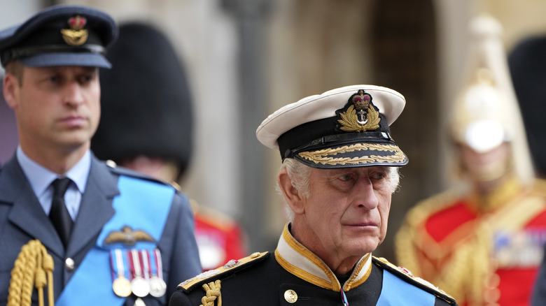 King Charles III and William, Prince of Wales in uniform at Queen Elizabeth's funeral