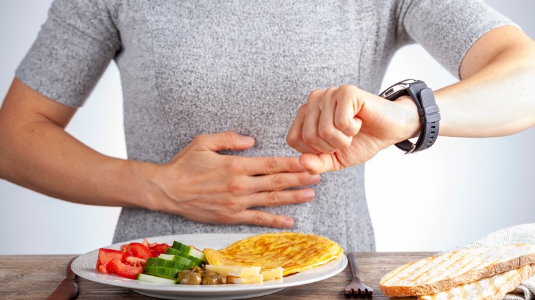 Person with plate of food