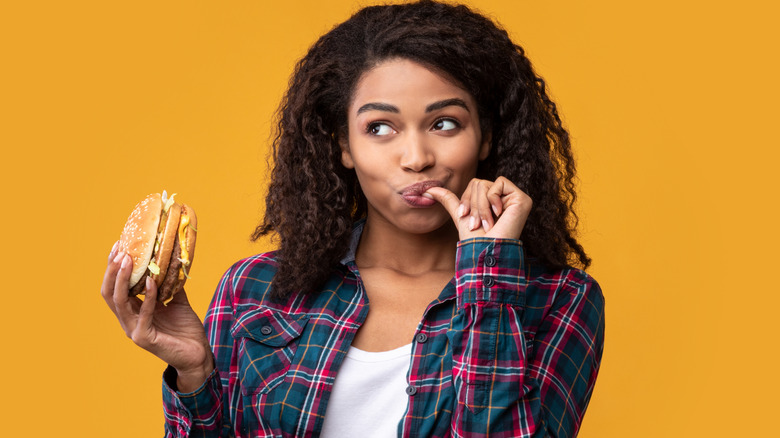 Woman eating a burger