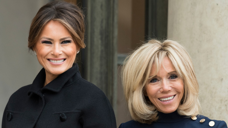 Melania Trump and Brigitte Macron smiling