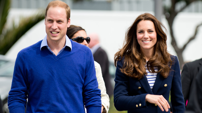 Prince William, Kate Middleton walking, smiling