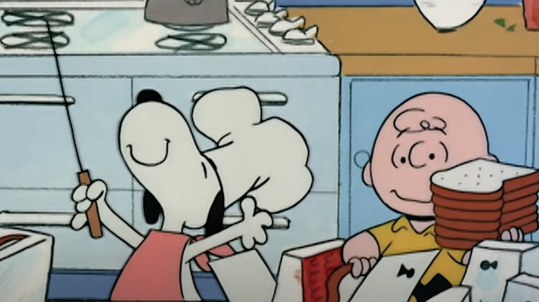 Charlie Brown, Linus and Snoopy making toast