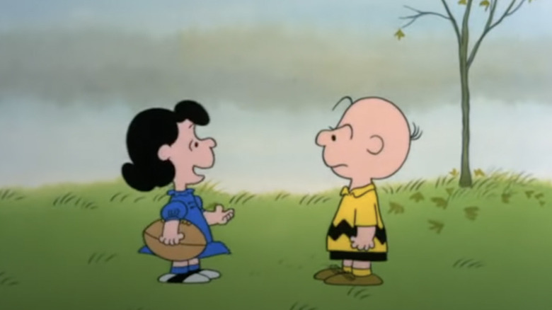 Lucy and Charlie Brown football