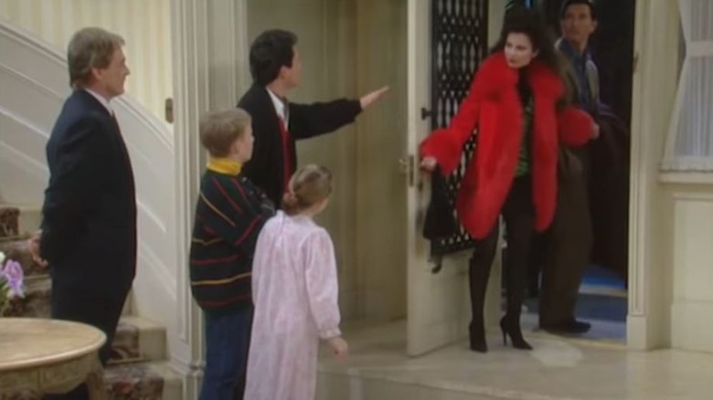 The Nanny walking out the door