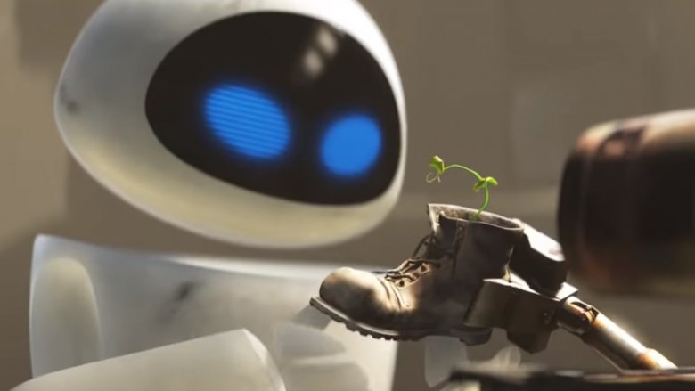 WALL-E handing EVE the plant in WALL-E