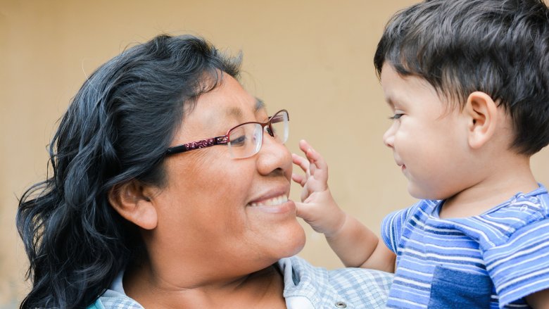 smiling mom with child