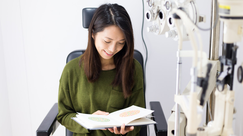 woman taking test for color blindness