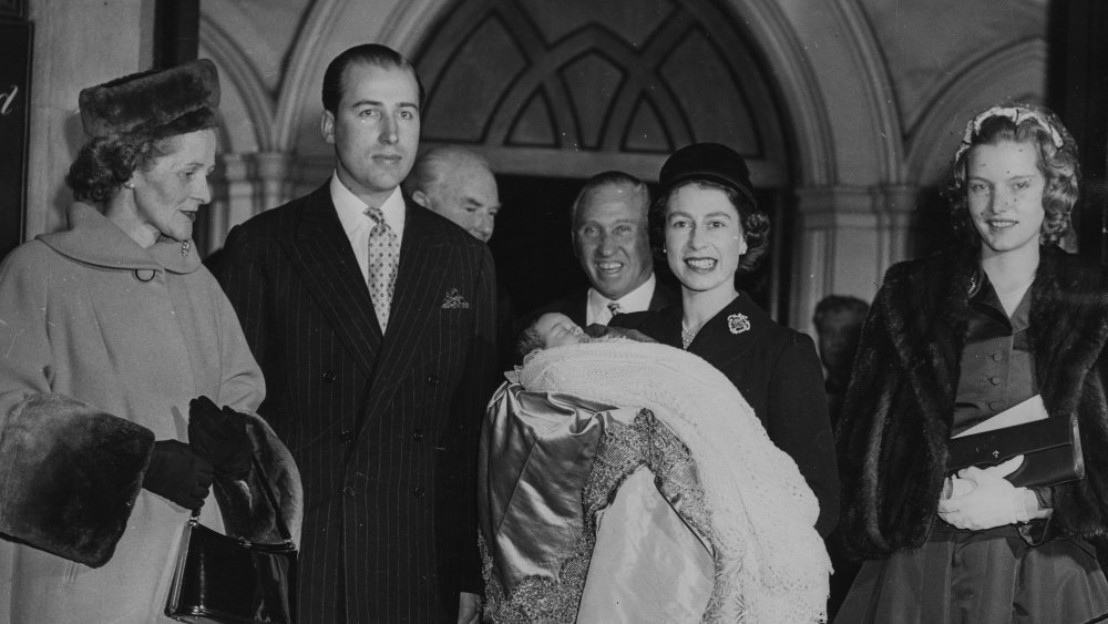 Queen Elizabeth as a young woman with her baby