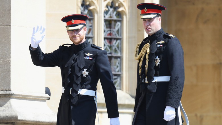Prince Harry waving, Prince William talking