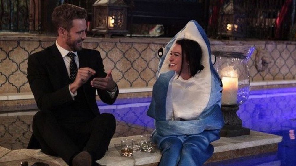 Nick Viall and Alexis Waters in a shark costume on The Bachelor