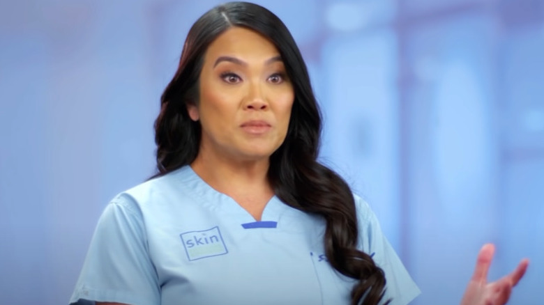 Dr. Pimple Popper in scrubs