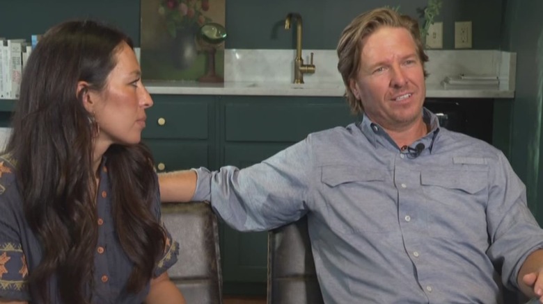 Joanna Gaines looking at Chip