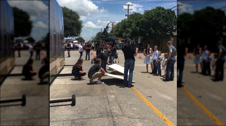 Crowds watching "Fixer Upper" film