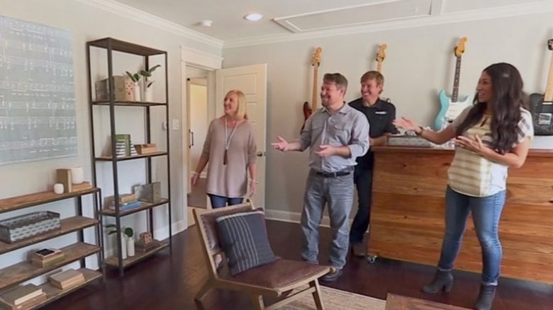 Chip, Joanna Gaines showing a room