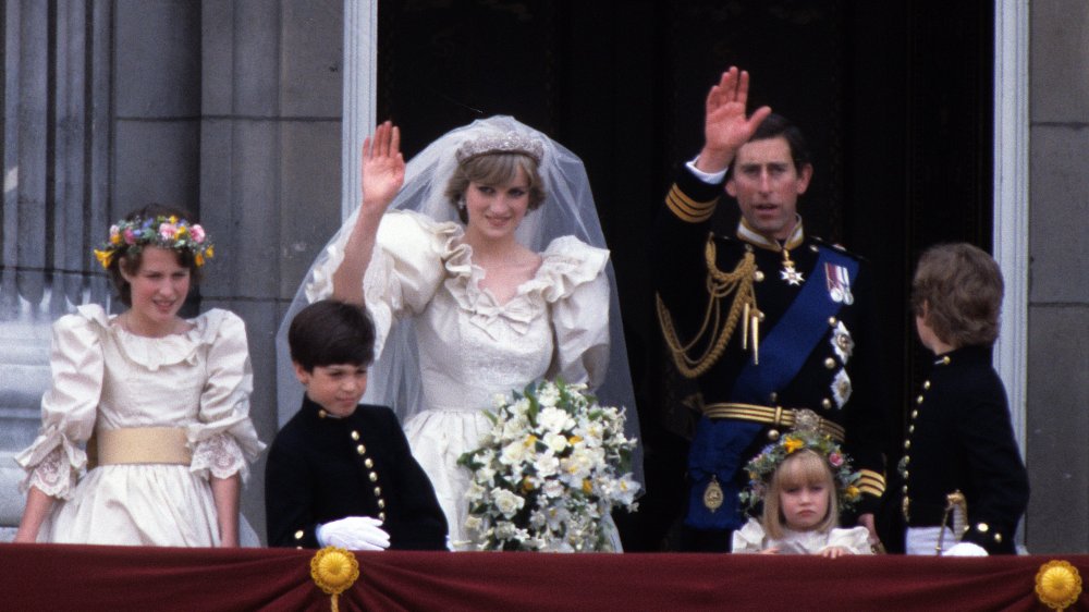 Princess Diana and Prince Charles waving to the crowd