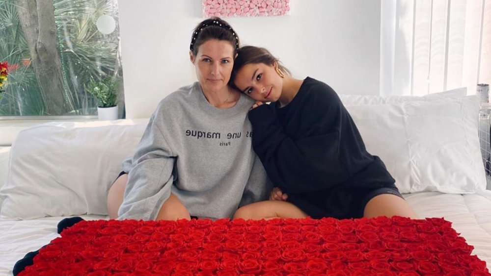 TikTok star Addison Rae with her mother on a couch