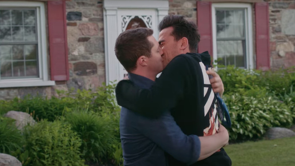 David and Patrick kiss in Schitt's Creek