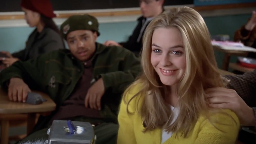 Alicia Silverstone as Cher from Clueless wearing yellow at school