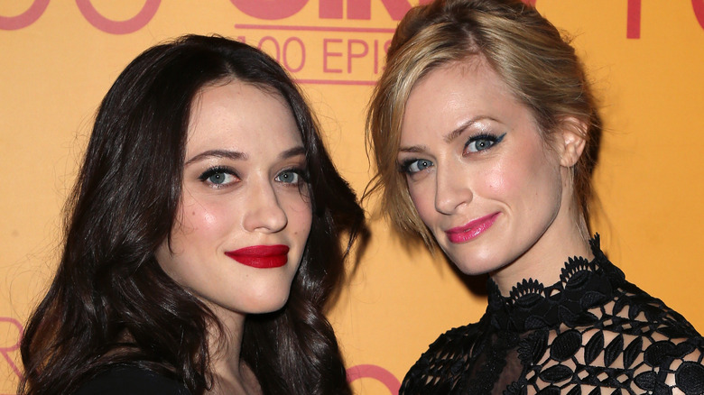 Kat Dennings and Beth Behrrs posing