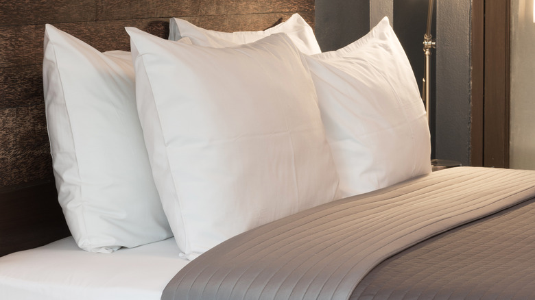 hotel room bed pillows, something you should absolutely avoid touching