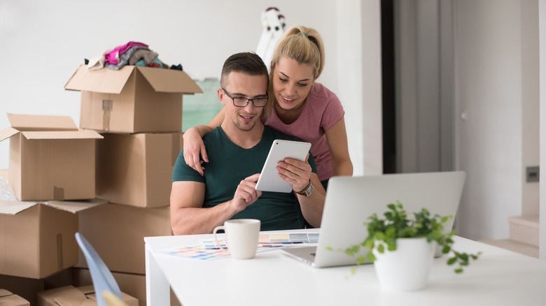 Couple looking at laptop