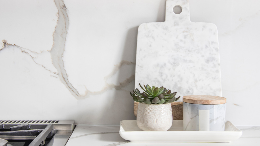 cutting board on kitchen counter