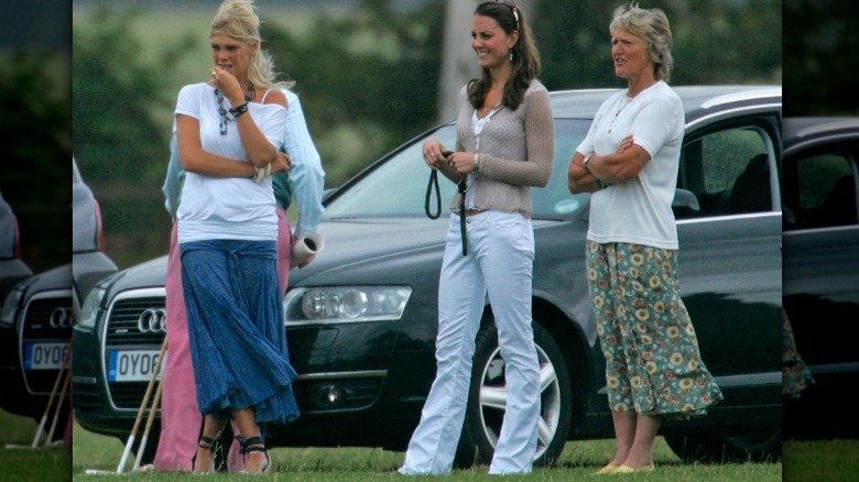 Kate Middleton, Chelsy Davy, and another woman at an event 