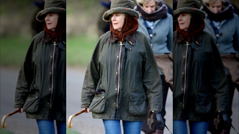 Queen Camilla wearing blue jeans