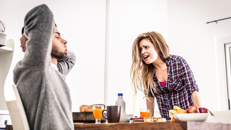 woman yelling at man