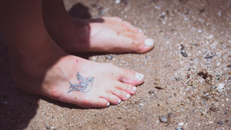 small tattoo on foot