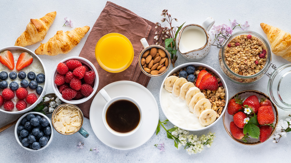 Continental breakfast laid out on a gray table