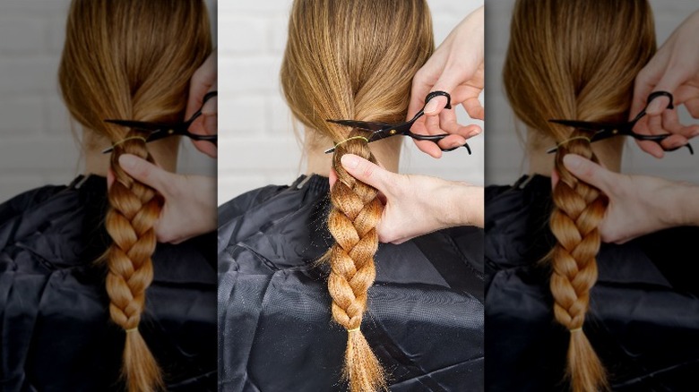 Woman having long braid cut off