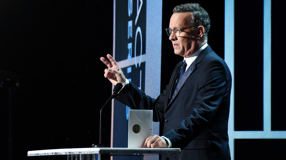 Tom Hanks speaking onstage