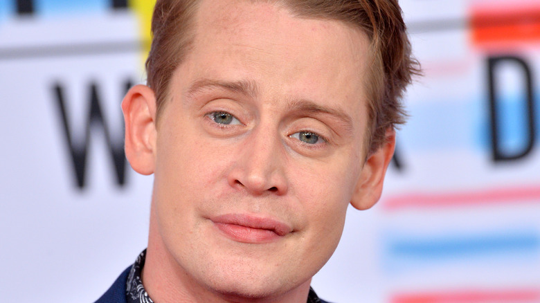 Macaulay Culkin smiling