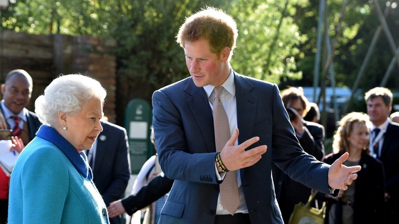 Queen Elizabeth II Prince Harry walking