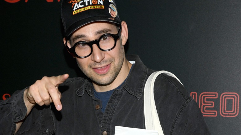 Jack Antonoff smiling and pointing