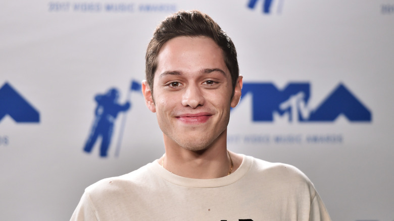 Pete Davidson grinning