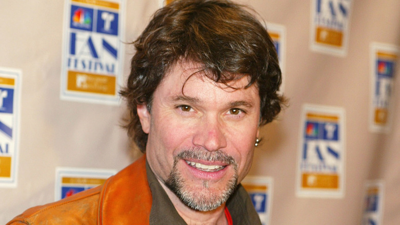 Peter Reckell smiling at an event. 