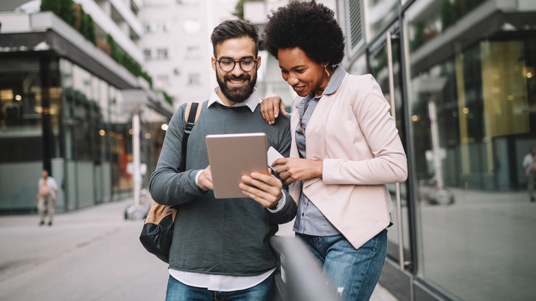 Couple looking at tablet