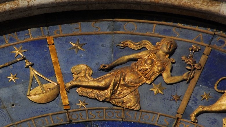 Virgo symbol on astrological clock 