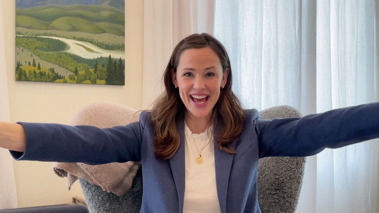 Jennifer Garner smiling with arms wide open 