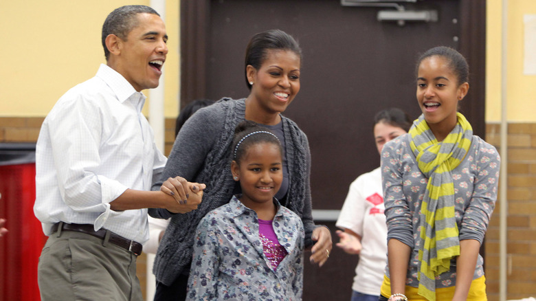 Obama sisters Malia and Sasha, Barack, and Michelle Obama