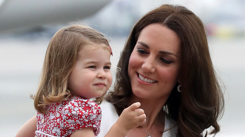 Catherine Middleton smiles at daughter Princess Charlotte