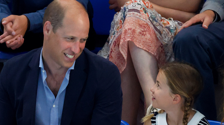 Prince William smiles lovingly at daughter Princess Charlotte