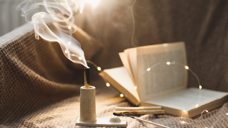 Smoky incense with an open book