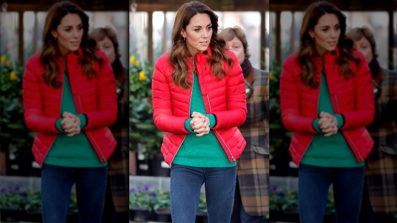 Kate Middleton in skinny jeans, green sweater, red coat