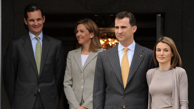 Princess Cristina, King Felipe, Queen Letizia and Inaki Urdangarin smiling