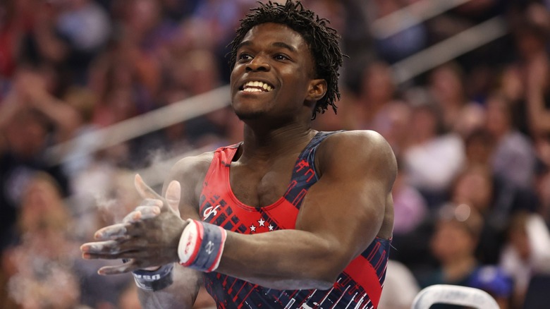 Fred Richard smiling and clapping at Olympic trials