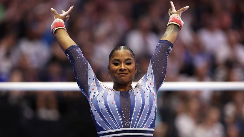 Jordan Chiles smiling while performing at the Olympic Trials