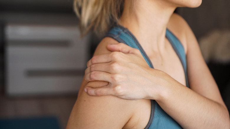 Woman with an injured shoulder